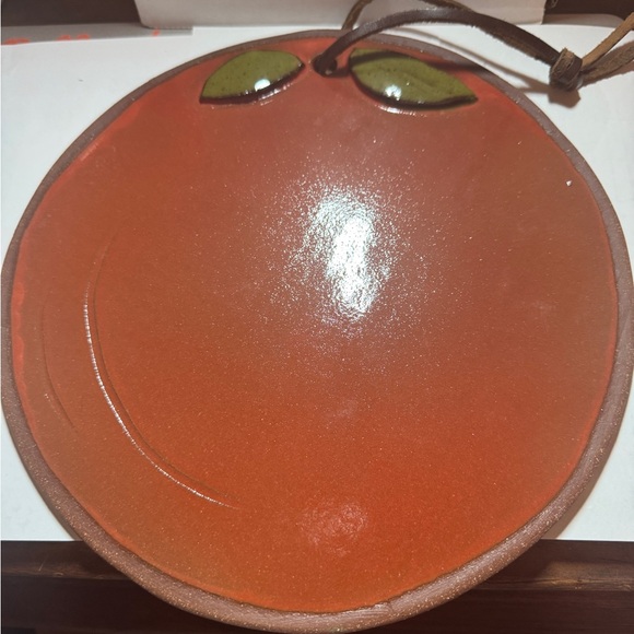 Other - Handcrafted 8” pottery tomato hot plate/cutting board